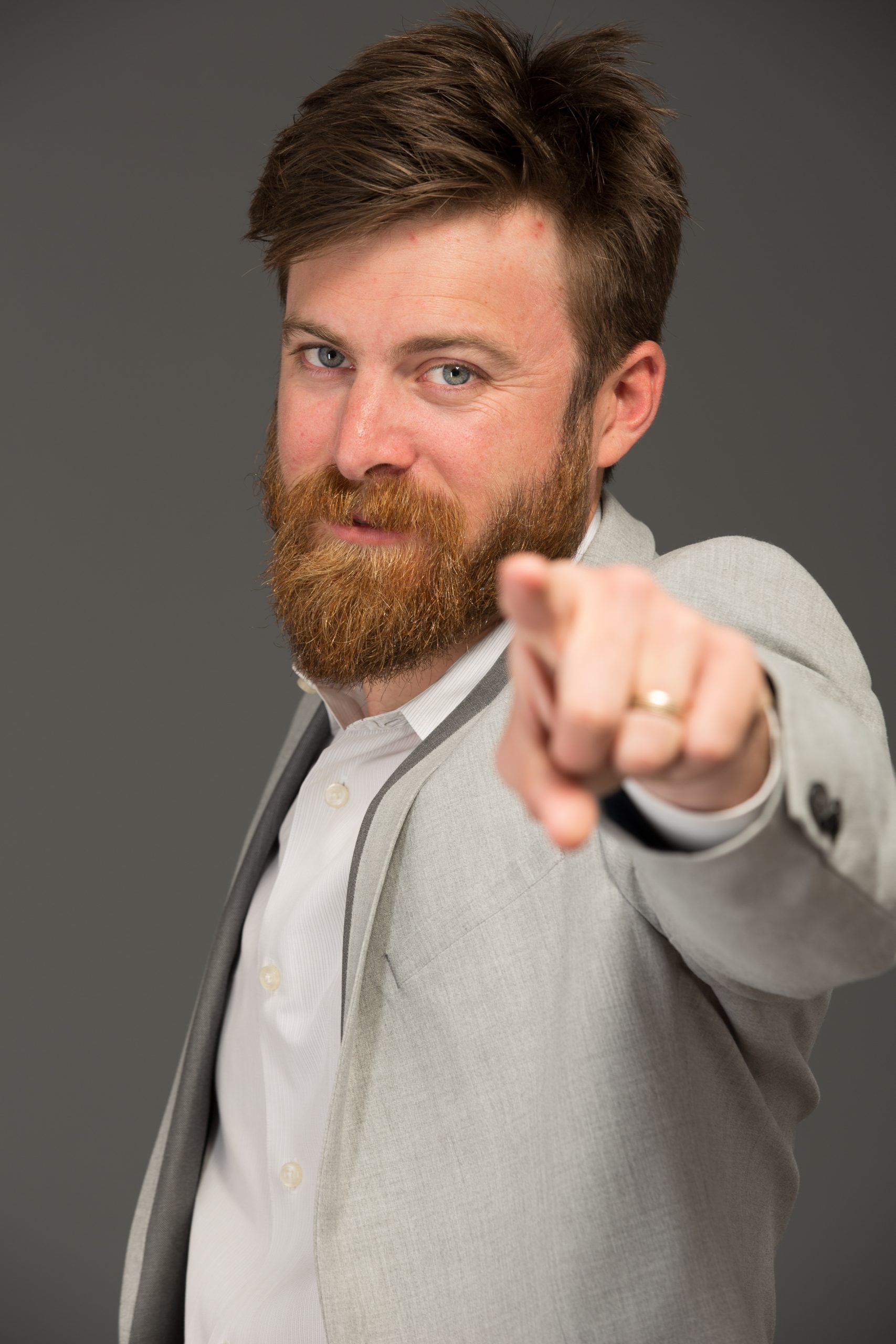 John Crestani business portrait in grey suit